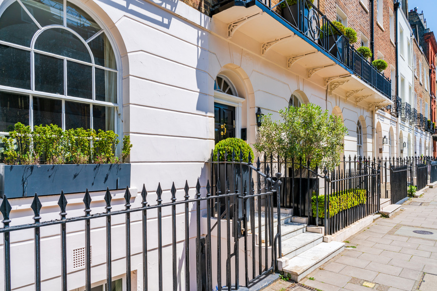 Elegant terraced houses in residential street of Belgravia, London, UK