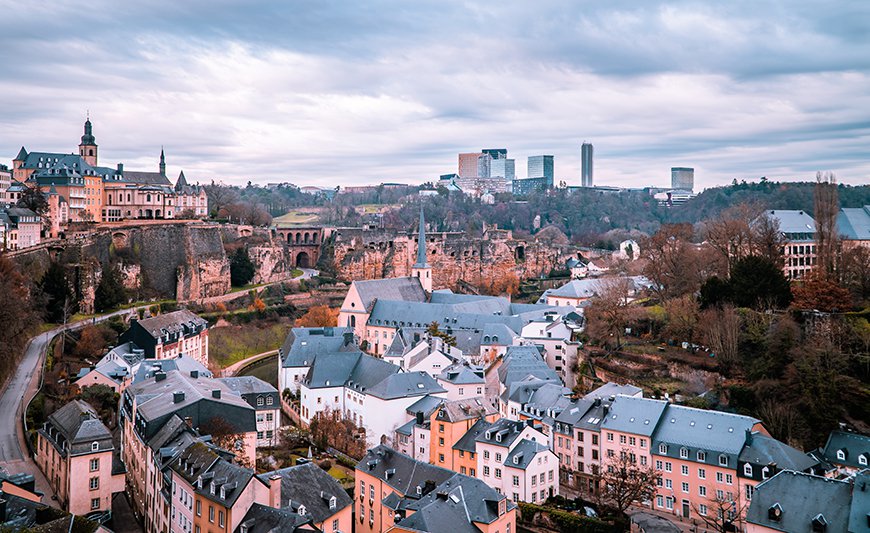 Panoramic view of the skyline of Luxembourg-City with rows of houses and different properties.